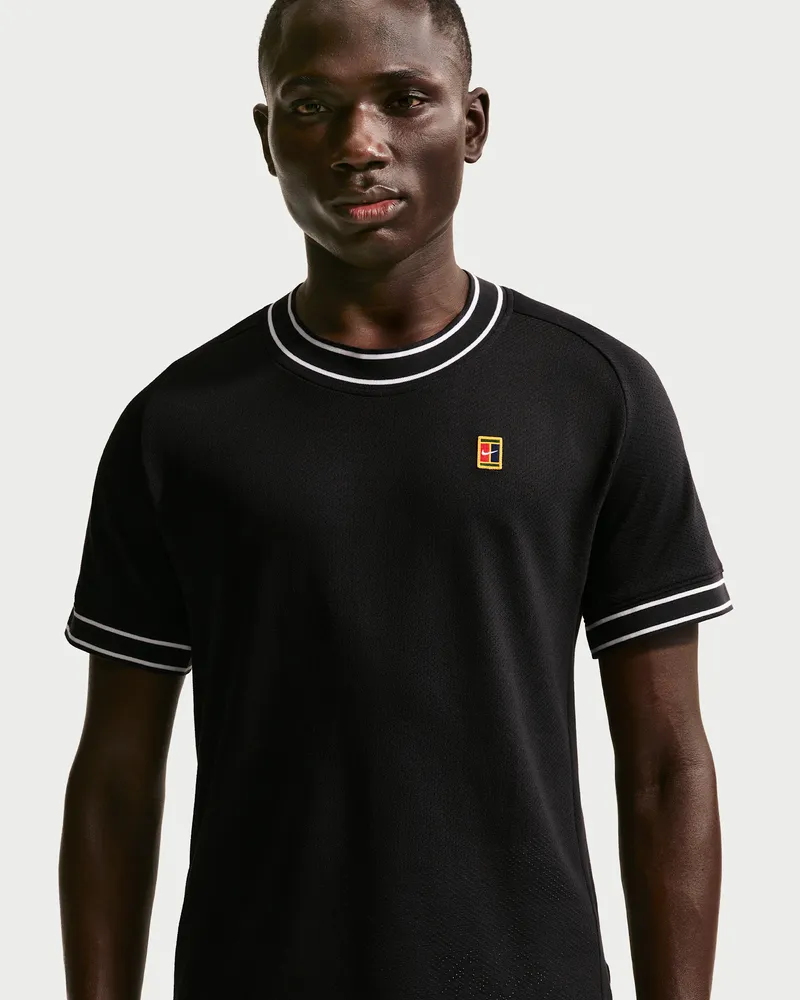 Nike Court Heritage Kurzarm-Tennisoberteil für Herren - Schwarz Schwarz