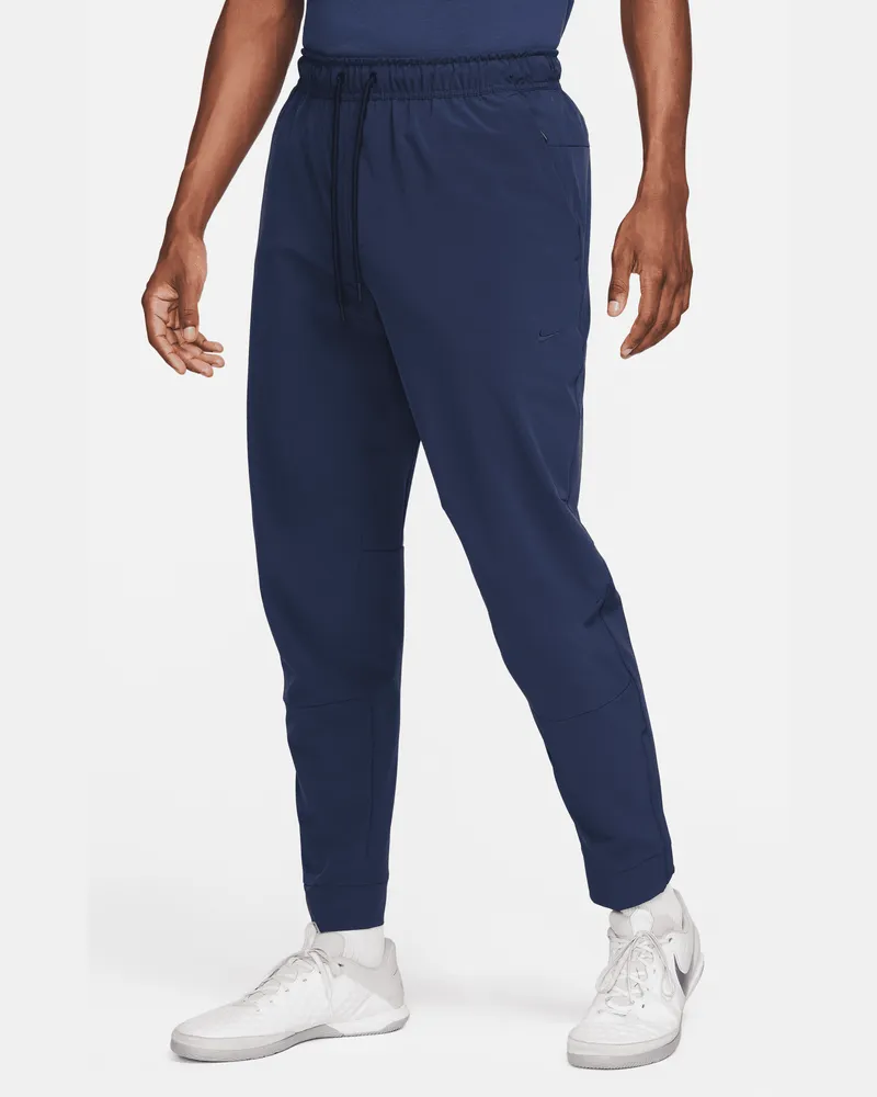 Nike Unlimited vielseitige Dri-FIT Hose mit Reißverschluss am Bündchen für Herren - Blau Blau