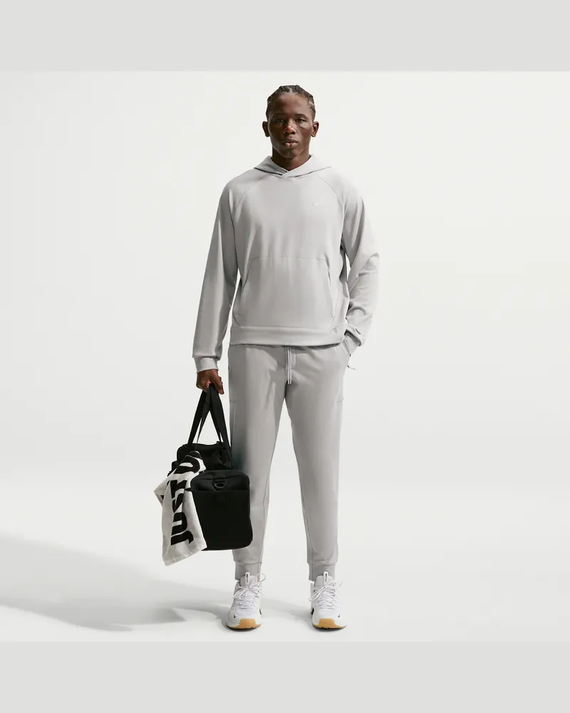 Nike Primary NanoKnit Performance Jogger mit Dri-FIT und UV-Schutz für Herren - Braun Braun