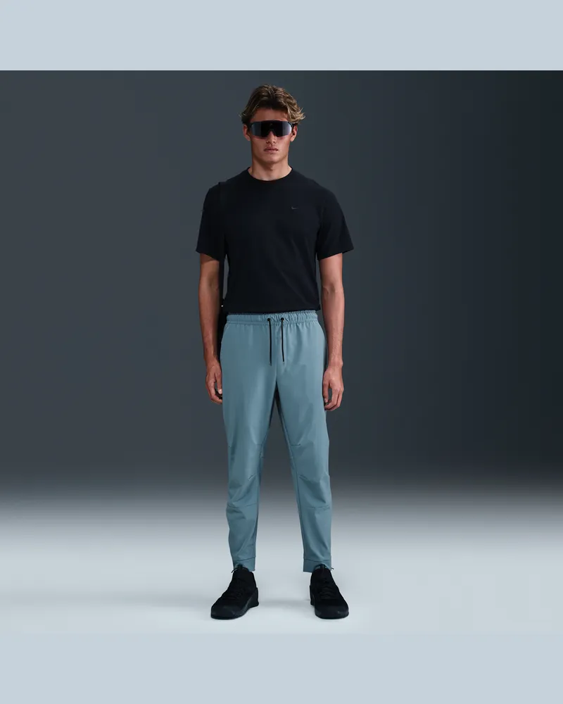 Nike Unlimited vielseitige Dri-FIT Hose mit Reißverschluss am Bündchen für Herren - Blau Blau