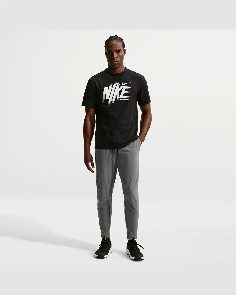 Nike Unlimited vielseitige Dri-FIT Hose mit Reißverschluss am Bündchen für Herren - Grau Grau