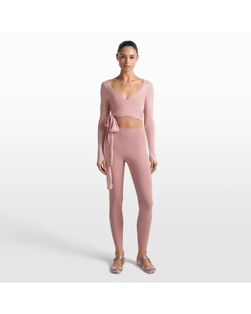 Nike SKIMS Matte V-Panel Stirrup Leggings (Damen) - Pink Pink