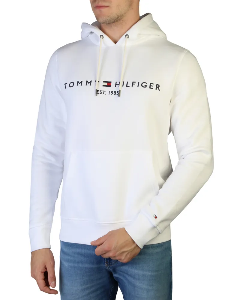 Tommy Hilfiger Marke:  Kollektion: Herbst/Winter Geschlecht: Mann Typ: Sweatshirt Ärmel: Lang Außentaschen: 2 Material: Baumwolle 64%, Polyester 36% Muster: Einfarbig Waschen: Waschen bei 30°c Model Größe, cm: 185 Model trägt eine Größe: L Passform: Regulär Kapuze: Fest Innen: Flauschig Saum: Gerippt Details: Sichtbares Logo Weiß