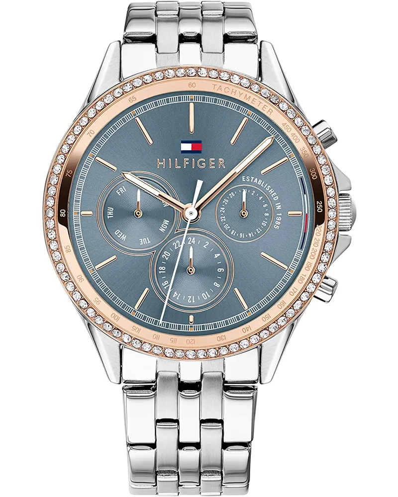 Tommy Hilfiger Diese elegante und modische Uhr mit Steinbesatz ist ein perfektes Geschenk für Neujahr, Geburtstag, Valentinstag etc. Diese Multi Dial Uhr hat eine Kalenderfunktion: Tag-Datum, 24-Stunden-Anzeige, Tachymeter Hochwertiges Edelstahlarmband Silber 19 cm lang und 16 mm breit mit einer Schließe Faltschließe mit Drücker Gehäusedurchmesser: 38 mm, Gehäusedicke: 9 mm, Gehäusefarbe: Mehrfarbig und Zifferblattfarbe: Blau Wasserdicht: 3 bar-Gewicht: 90 g Silber