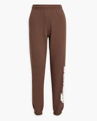 ROTATE Birger Christensen Mimi Track Pants aus Baumwollfleece mit Print Braun