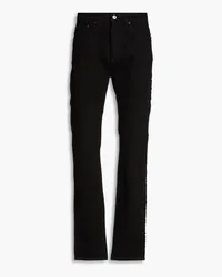 J.W.Anderson Skinny Jeans aus Denim mit Fransen Schwarz