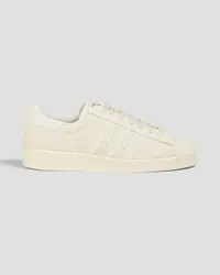 adidas Superstar 82 Sneakers aus Veloursleder und Canvas Weiß