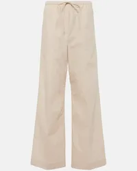 Totême Weite High-Rise-Hose aus Baumwolle Beige