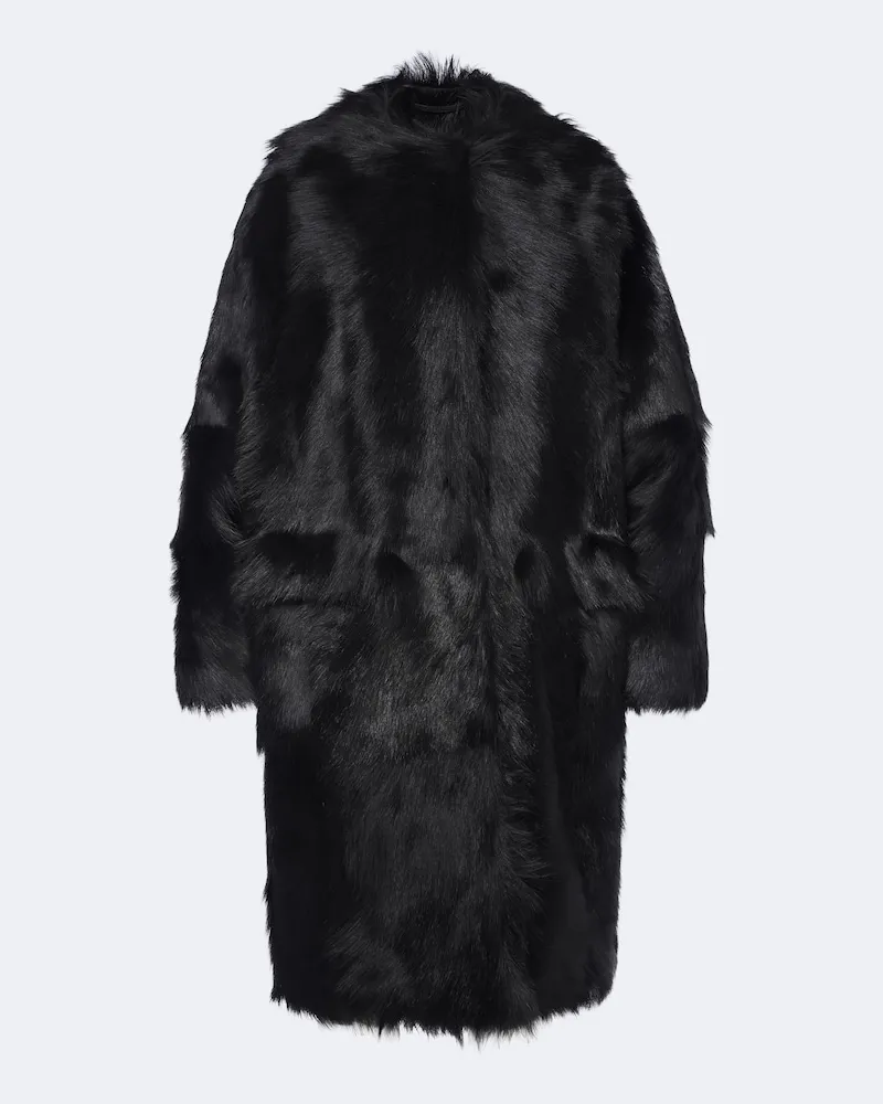 Totême Mantel aus Shearling Schwarz