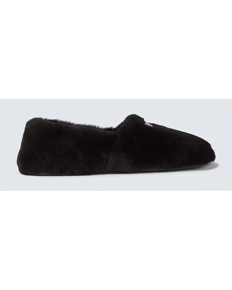 Prada Slip-Ons aus Shearling Schwarz