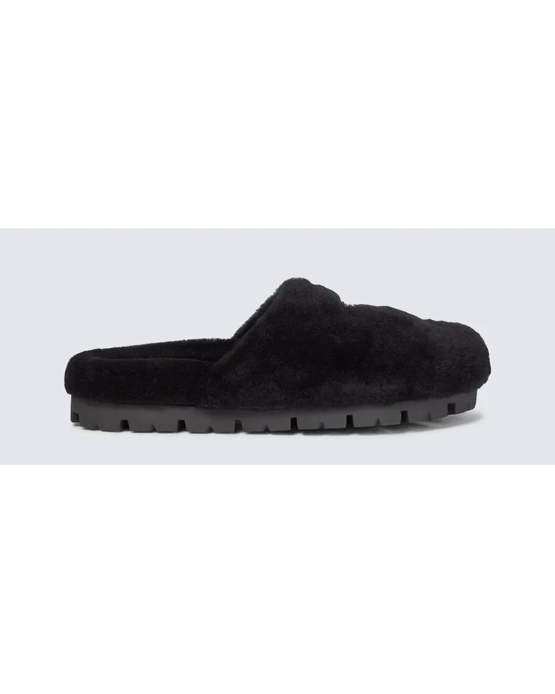 Prada Slippers aus Shearling Schwarz
