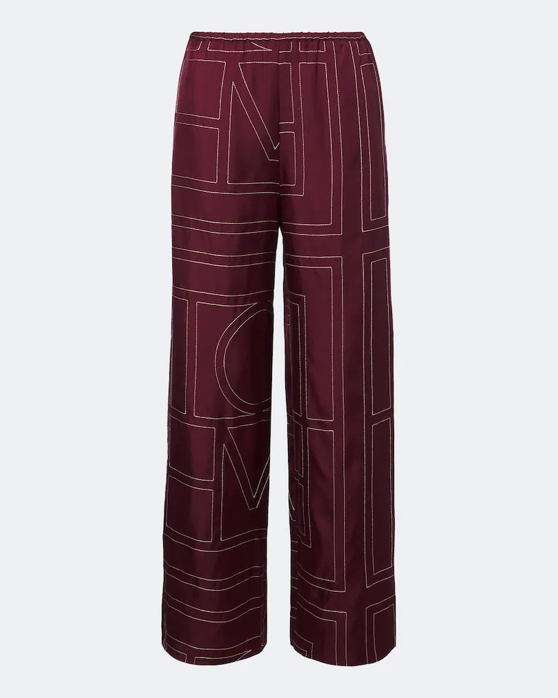 Totême Weite Hose Monogram aus Seiden-Twill Burgunderrot