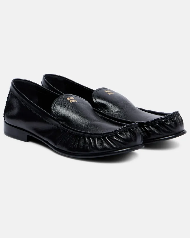 Miu Miu Slip-Ons aus Leder Schwarz