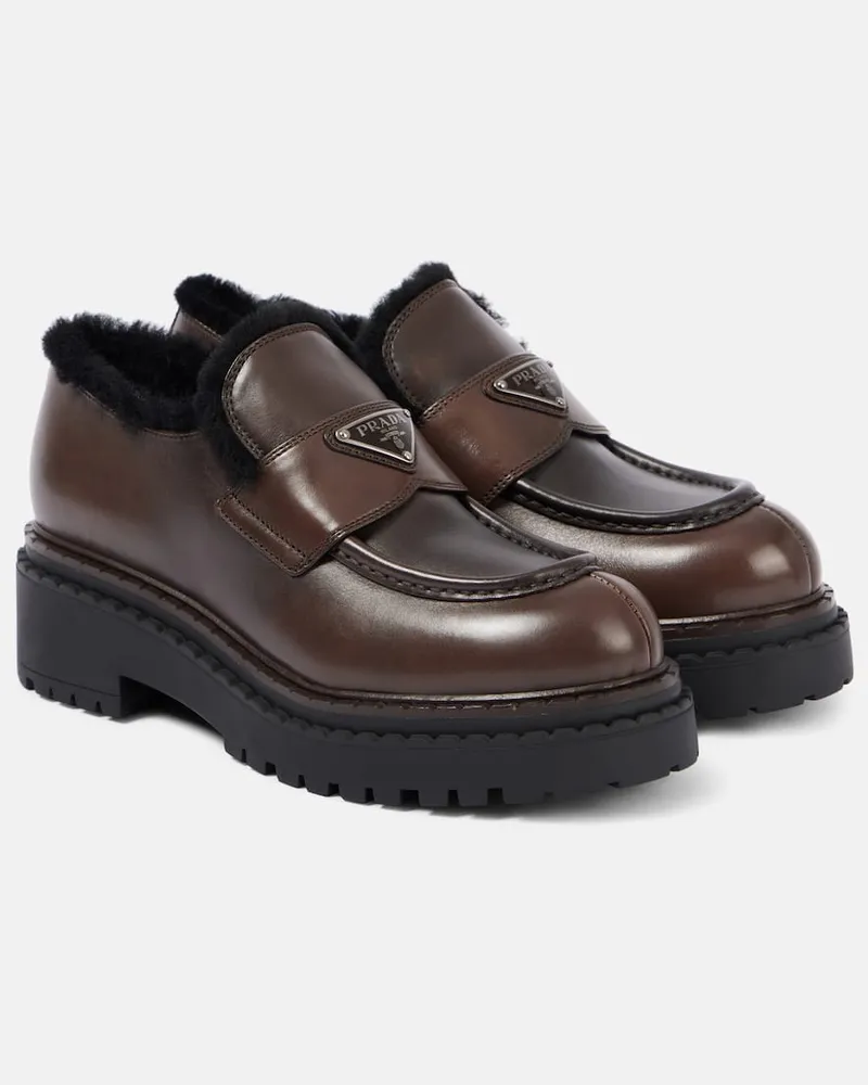 Prada Loafers aus Leder mit Shearling Braun