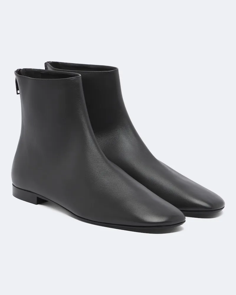 Totême Ankle Boots aus Leder Schwarz