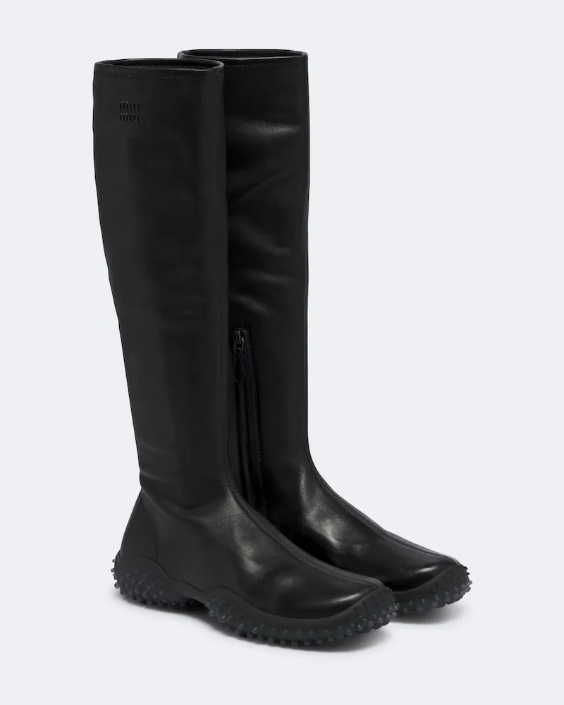 Miu Miu Kniehohe Stiefel aus Leder Schwarz