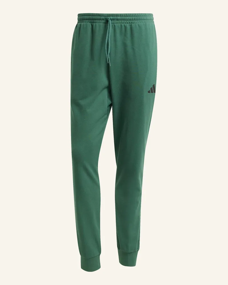 adidas Essentials Feel Cozy French Terry Hose gruen Grün