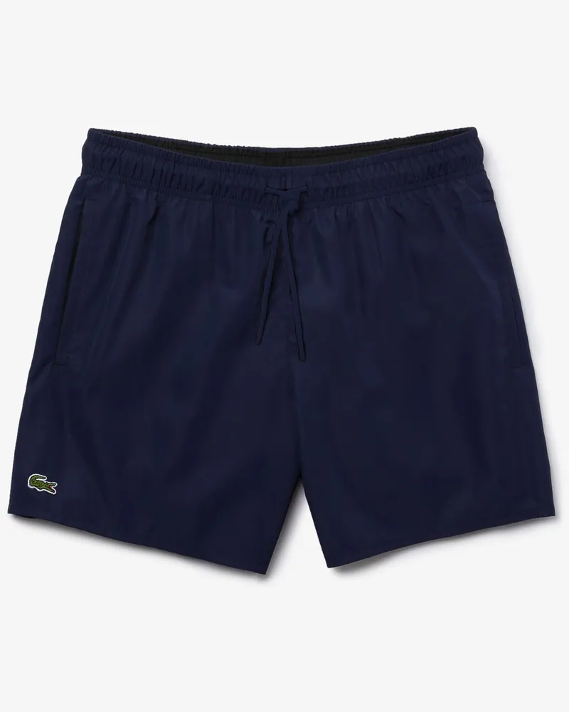 Lacoste Unifarbene Badeshorts mit Krokodil-Aufnäher in Marine