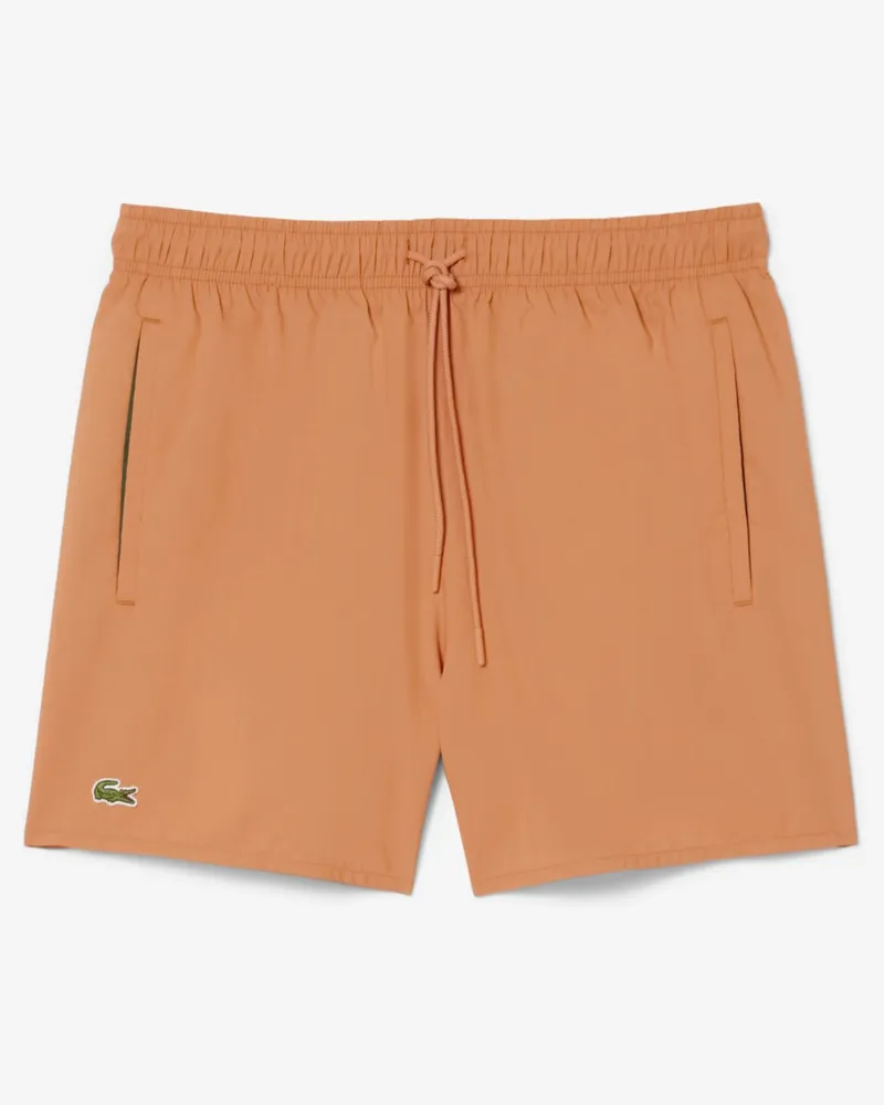 Lacoste Unifarbene Badeshorts mit Krokodil-Aufnäher in Orange