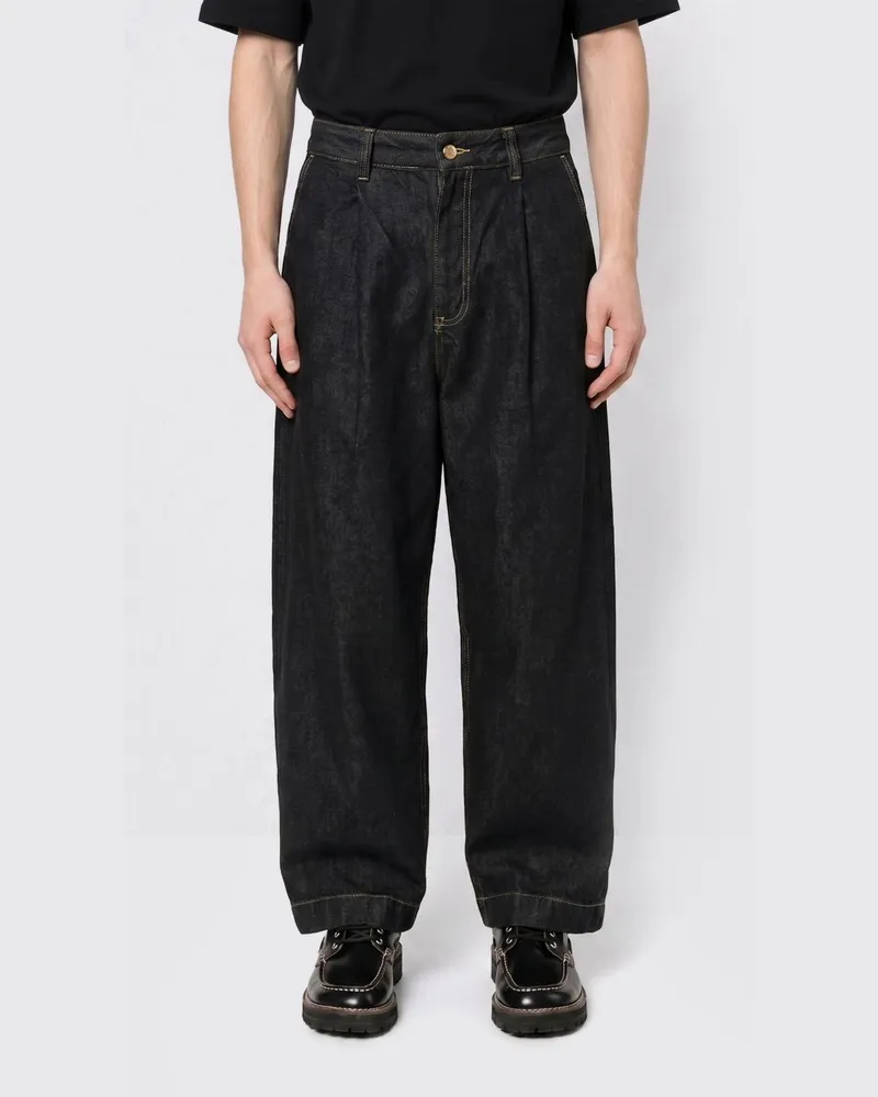 Studio Nicholson Baggy Jeans aus Denim Schwarz