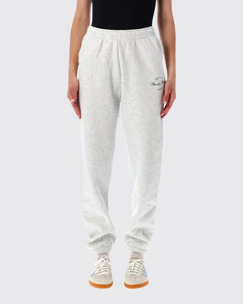 SPORTY & RICH SPORTY  RICH Sporty & Rich Hoch taillierte Slim-Fit Jogginghose aus Baumwolle mit Logo Grau