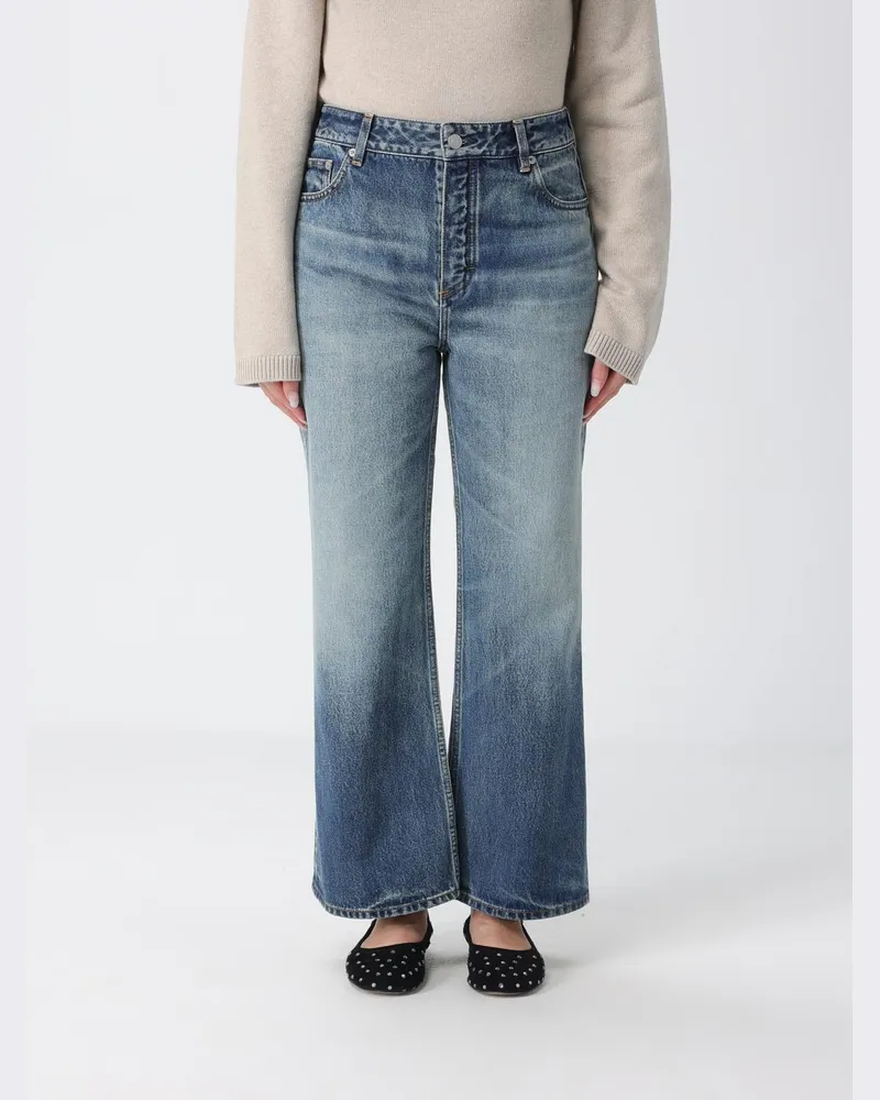Alaïa Mid-Rise Flared Jeans aus Baumwolldenim mit Fünf-Taschen-Design Ivory