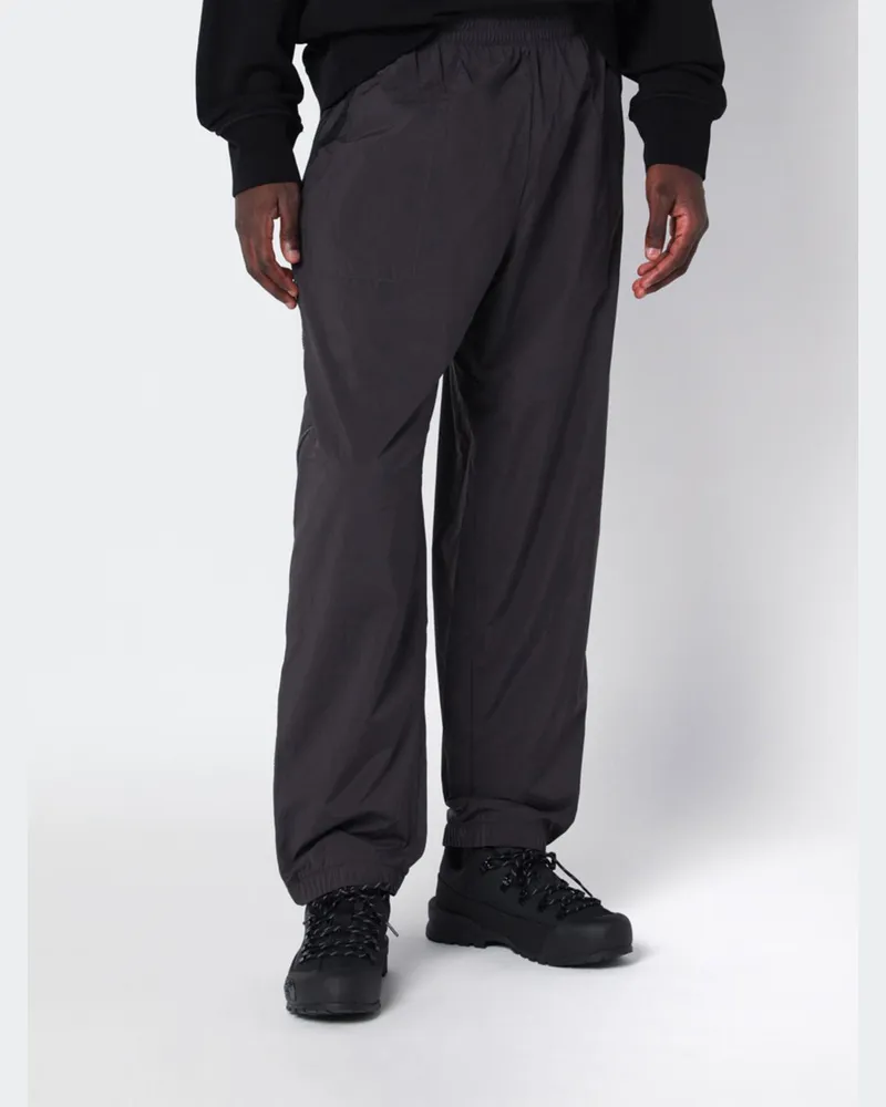 The North Face TNF™ Red Box Jogginghose mit weitem Bein aus technischem Windwall™-Gewebe Schwarz