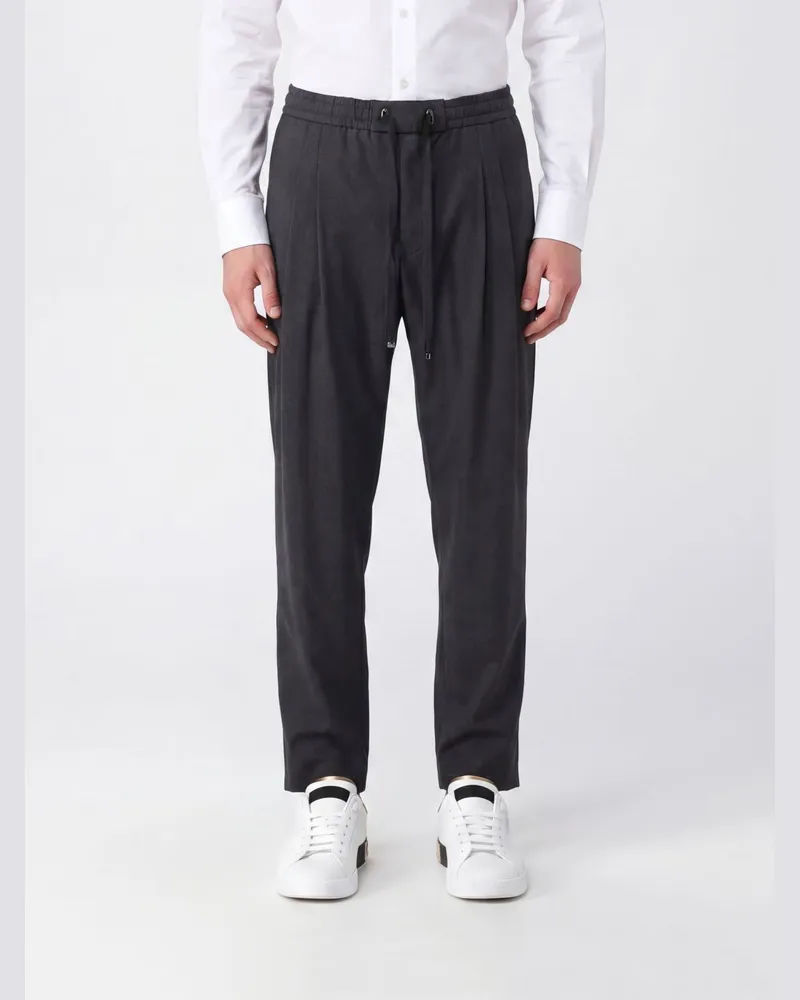 Dolce & Gabbana DOLCE  GABBANA Jogginghose Dolce & Gabbana aus Schurwolle mit Bundfalten und Kordelzug Schwarz