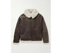 Giacca in shearling con finiture in pelle