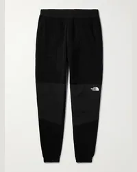 The North Face Pantaloni sportivi a gamba affusolata in shell e pile Polartec riciclati Denali Nero