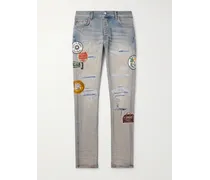 Jeans slim-fit effetto consumato con applicazioni
