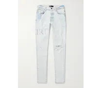 Jeans skinny effetto invecchiato con cristalli e logo applicato