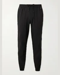 LULULEMON Pantaloni sportivi slim-fit a gamba affusolata in shell stretch riciclato License to Train Nero