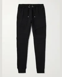 Balmain Pantaloni sportivi skinny in jersey di cotone con logo floccato Nero