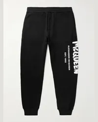 Alexander McQueen Pantaloni sportivi a gamba affusolata in jersey di cotone loopback con logo stampato Nero