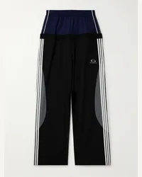 Balenciaga Pantaloni sportivi a gamba larga in jersey tecnico e shell a strati con righe Blu