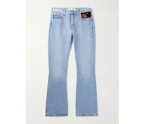 Jeans svasati con finiture in velour e ricami
