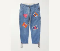 Jeans a gamba affusolata con applicazioni Gees B