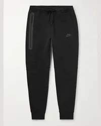 Nike Pantaloni sportivi a gamba affusolata in Tech Fleece di misto cotone con logo Nero