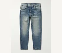 Jeans slim-fit in denim cimosato lavato in capo