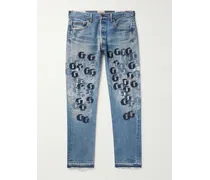 Jeans a gamba dritta effetto invecchiato con logo applicato Super G