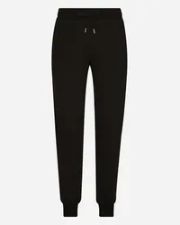 Dolce & Gabbana Pantalone Jogging In Jersey Con Placca Logata - Uomo Pantaloni E Shorts Nero Cotone Nero