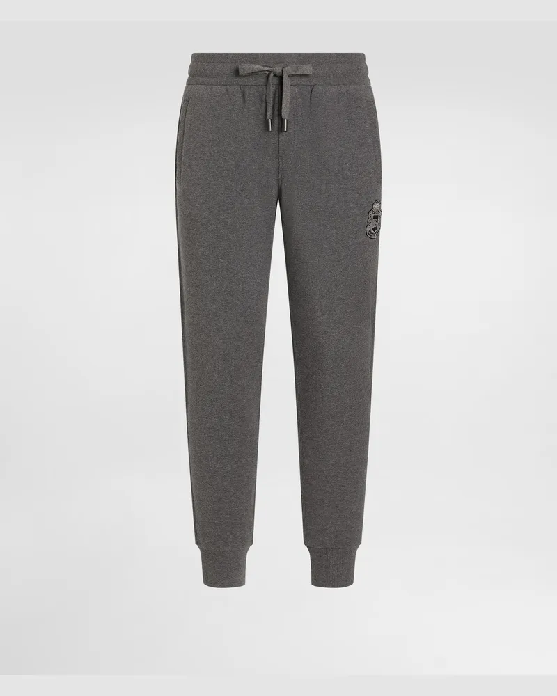 Dolce & Gabbana Pantaloni In Jersey Con Patch Araldico - Uomo Pantaloni E Shorts Grigio Melange