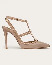 Valentino Garavani DÉCOLLETÉ ROCKSTUD IN VERNICE CON CINTURINI 100MM Donna POUDRE Poudre