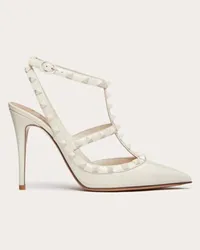 Valentino Garavani DÉCOLLETÉ ROCKSTUD IN VERNICE CON CINTURINI E BORCHIE IN TONO 100MM Donna LIGHT IVORY Light