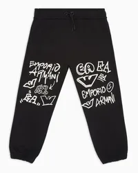 Emporio Armani OFFICIAL STORE Pantaloni Jogger In Jersey Stampa Logo Graffito Ea Crew Nero