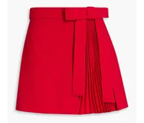 Skirt-effect bow-embellished pleated crepe shorts - Pink