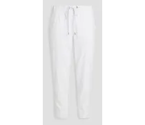 Cropped ribbed cotton and Lyocell-blend tapered pants - White