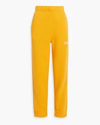 Ganni Embroidered organic cotton-fleece track pants - Yellow Yellow