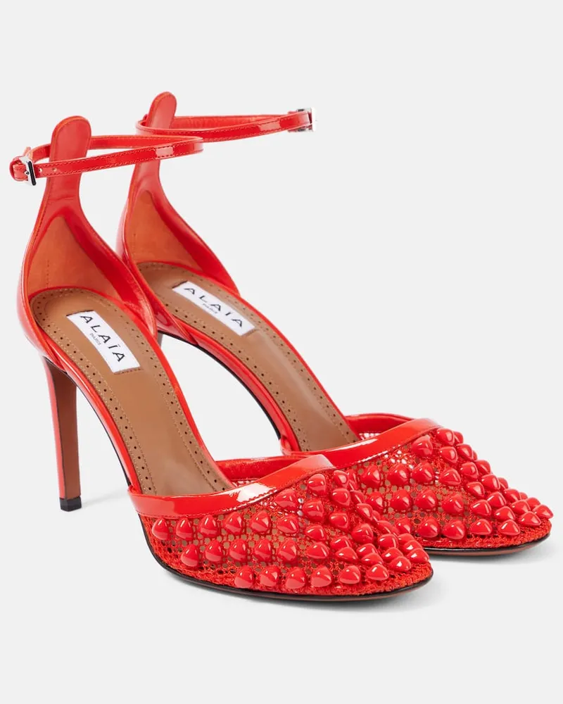 Alaïa AlaÃ¯a Pumps in pelle e mesh con borchie Arancione